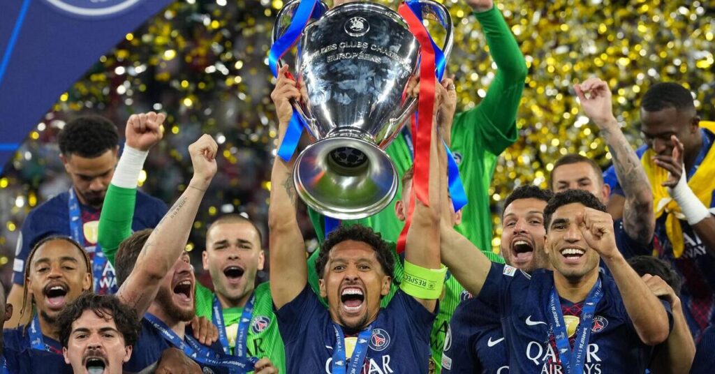 Brazil defender Marquinhos lifts the ChampionsLeague trophy for Paris Saint-Germain