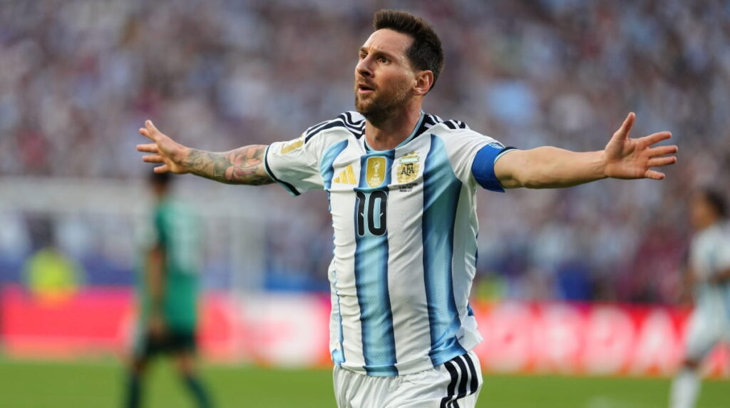Lionel Messi celebrates scoring for Argentina