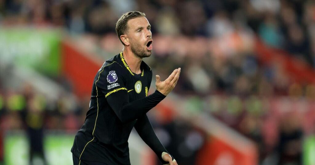 Jordan Henderson, on his first Chelsea start, barks instructions during the game with previous club Brentford